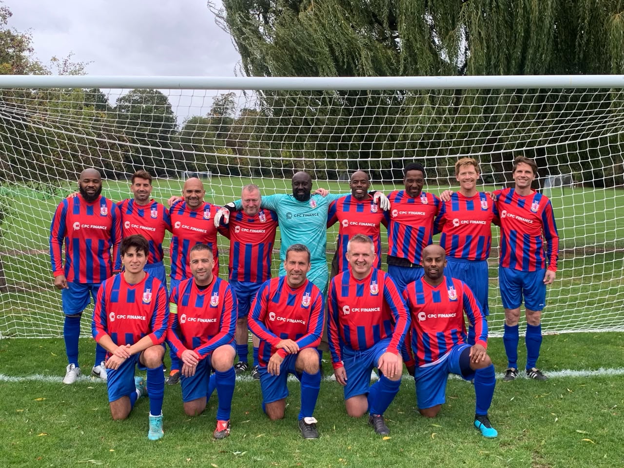 Old Lyonians team in blue and red striped shirts